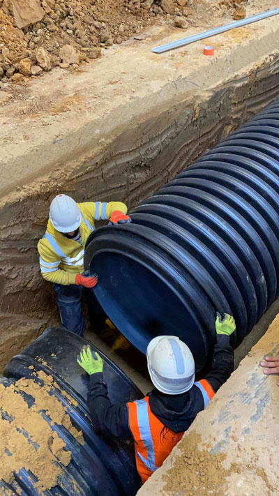 Installation of double-walled high-density polyethylene corrugated pipes in Créhen © Polieco France