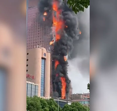 Burning skyscrapers in China © Frontlinestory via Twitter