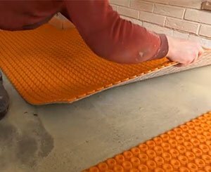 Create a heated floor with the Schlüter-DITRA-HEAT-PS self-adhesive mat