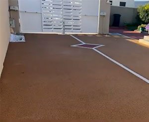We create a driveway in draining concrete