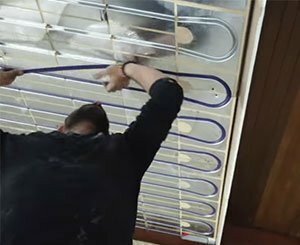 Plafond chauffant rafraîchissant Acosi+ fibre de bois dans le sud toulousain