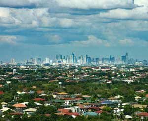 Aux Philippines, un cimetière où tentent de survivre les vivants démunis