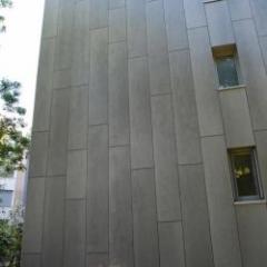 Panneau de façade en fibres ciment