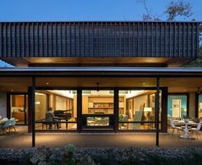 A 50s brick house reinvents itself with cropping and siding...