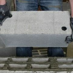 Bloc béton rectifié pour la construction de planchers