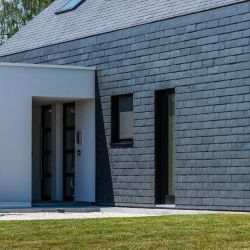 Simple and balanced natural slate ventilated facade