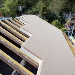Insulation solution for sloped roofs