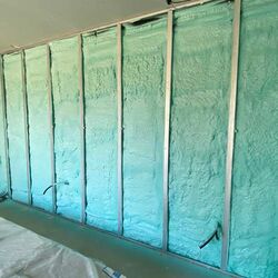Sprayed polyurethane thermal insulation process for wall insulation