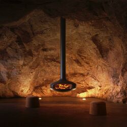 Suspended and pivoting central fireplace