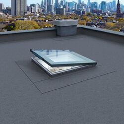 Self-contained flat roof window powered by solar energy